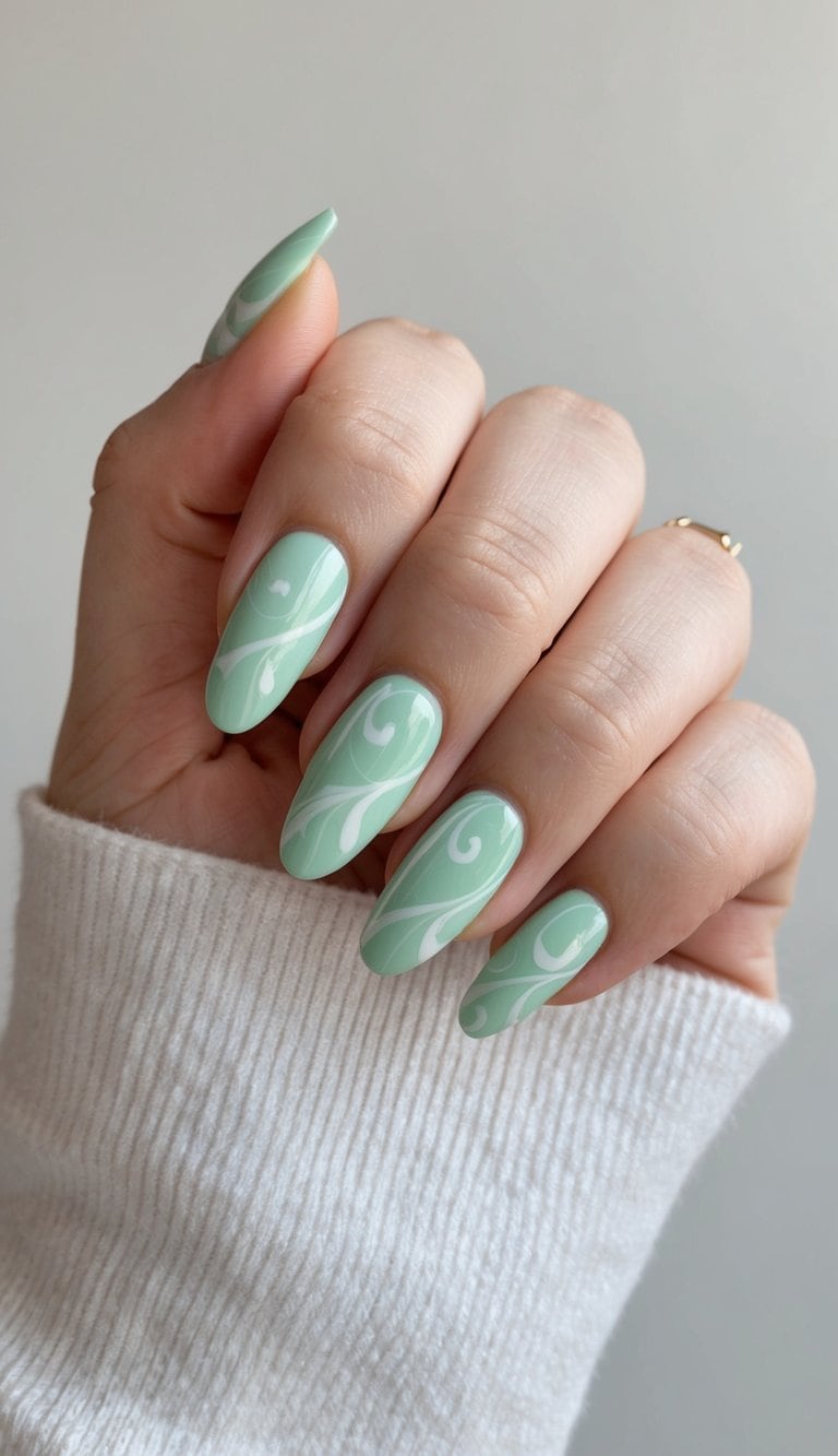 Mint Green Almond Nails With White Swirls Mint Green Almond Nails With White Swirls — Classy Sage Nails