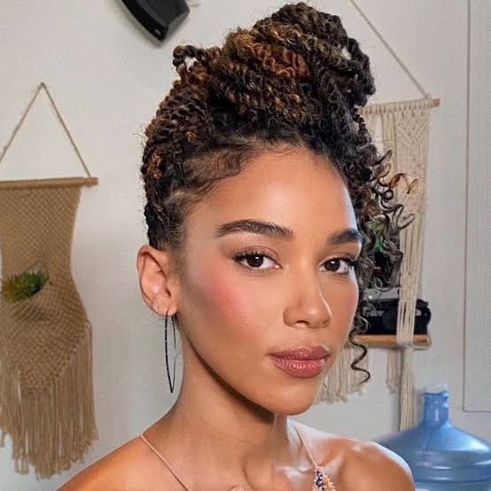 High Bun With Wispy Bangs High Bun With Wispy Bangs — Classy Senegalese Twists