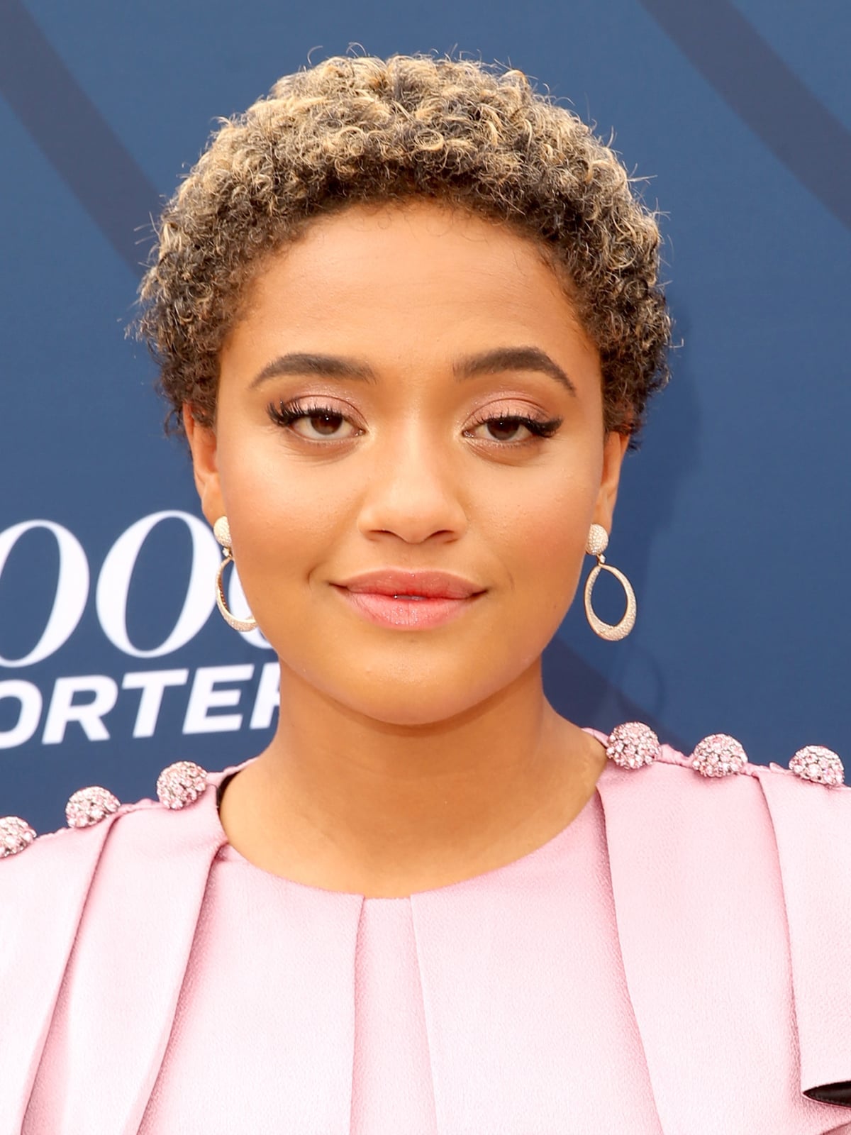 Textured Blonde Pixie With Curly Texture Textured Blonde Pixie With Curly Texture — Classy Short Haircuts for Round Faces