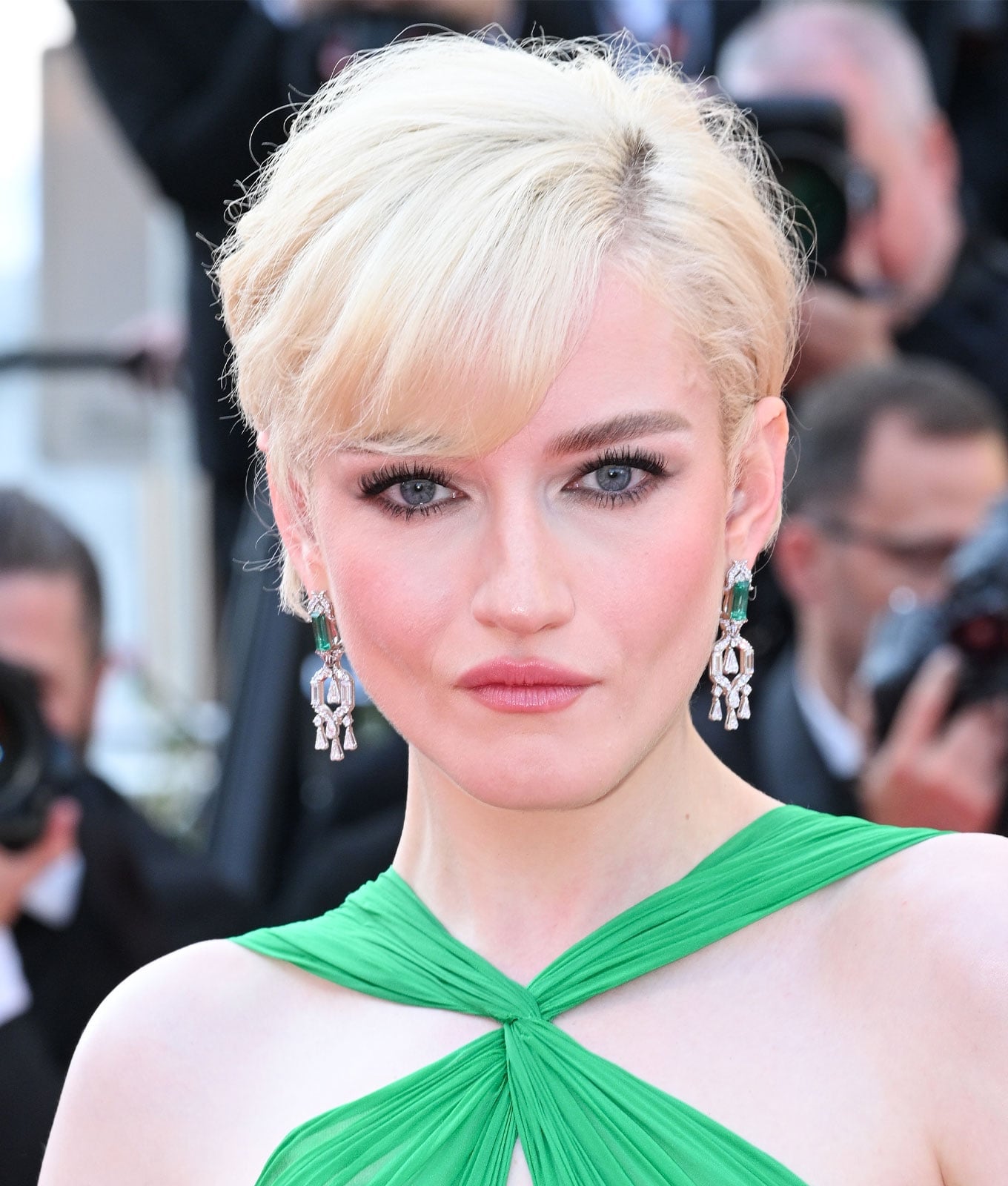 Textured Ash Blonde Pixie With Side Swept Bangs Textured Ash Blonde Pixie With Side Swept Bangs — Classy Short Haircuts for Round Faces