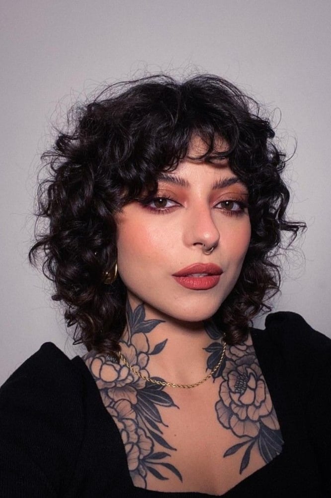 Chin Length Wolf Cut With Short Choppy Bangs — Classy Short Wolf Cut