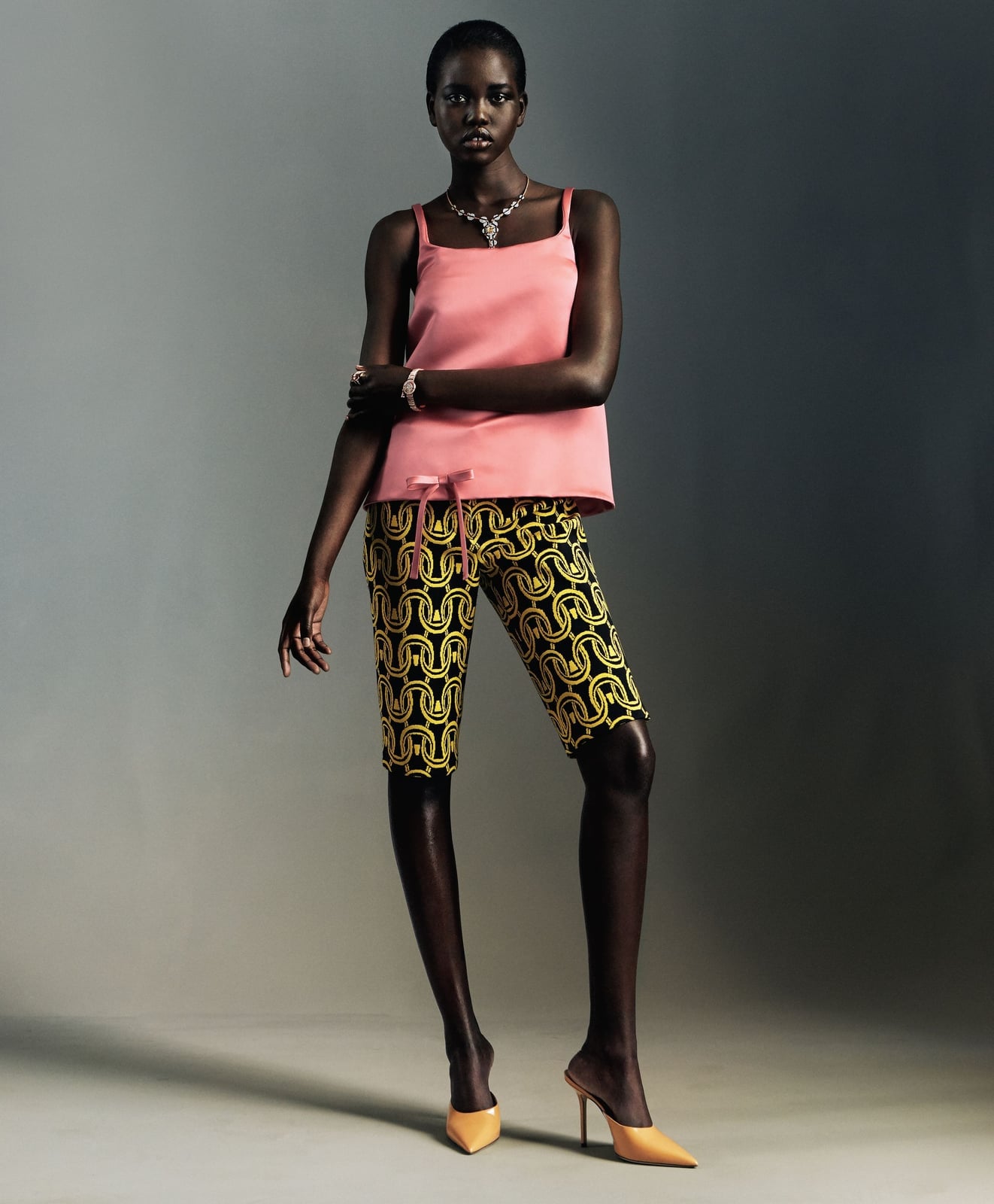 Graphic Print Bermuda Shorts with a Pink Tank Top Graphic Print Bermuda Shorts with a Pink Tank Top — Classy Shorts Outfits