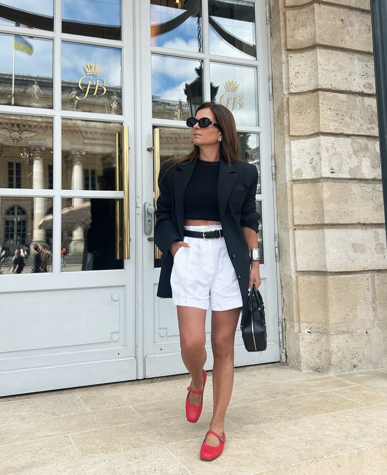 White Tailored Shorts with a Black Blazer and Cropped Top White Tailored Shorts with a Black Blazer and Cropped Top — Classy Shorts Outfits