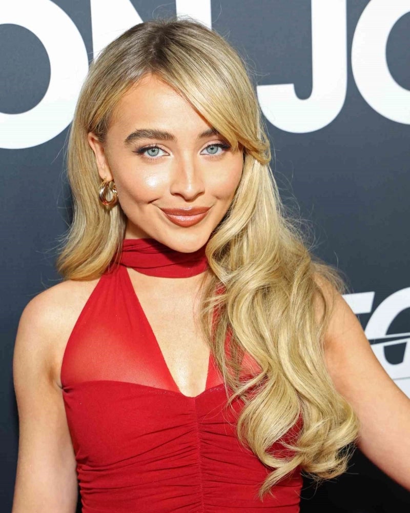 Mid-Back Light Blonde Waves With Side Bangs Mid-Back Light Blonde Waves With Side Bangs — Classy Side Bangs