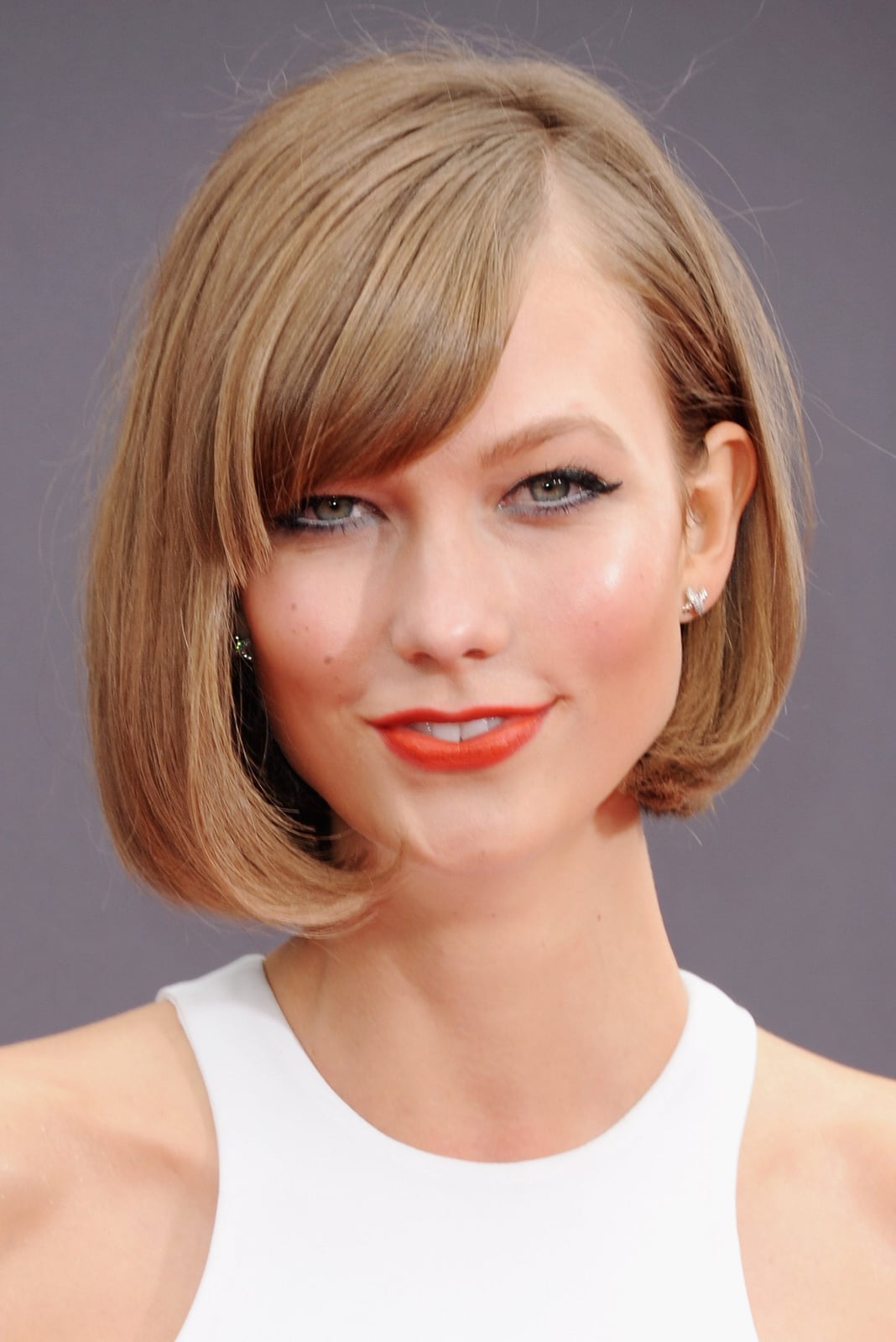Light Brown Bob With Sleek Side Swept Bangs Light Brown Bob With Sleek Side Swept Bangs — Classy Side Part Bangs