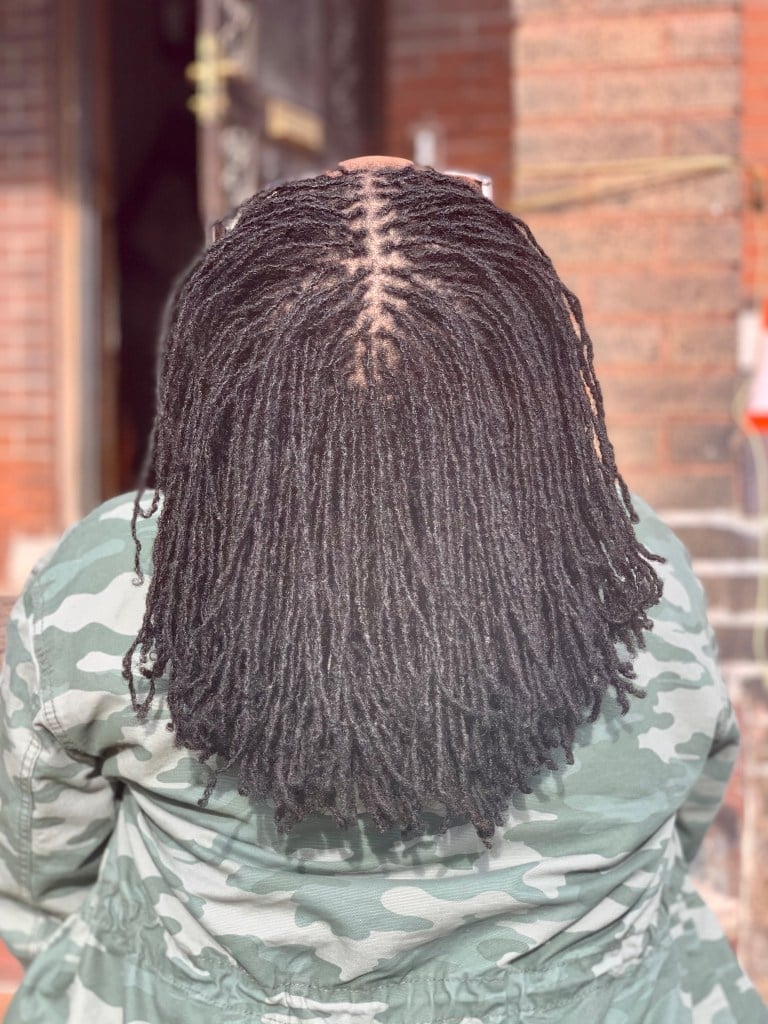 Mid-Back Wavy Locs With Red Undertones Loose Style Mid-Back Wavy Locs With Red Undertones Loose Style — Classy Sister Locs