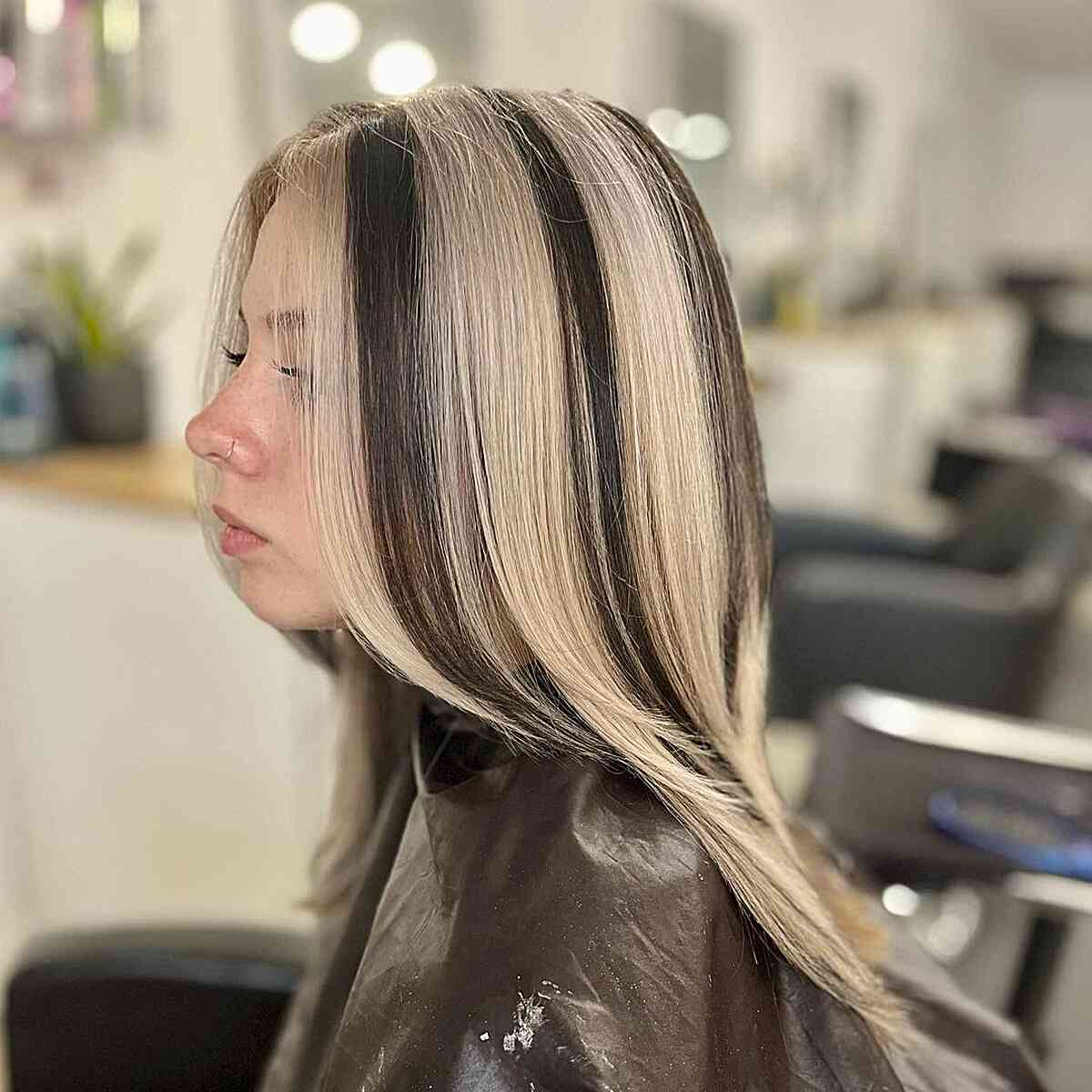 Collarbone Black With Bold Blonde Stripes Collarbone Black With Bold Blonde Stripes — Classy Skunk Stripe Hair