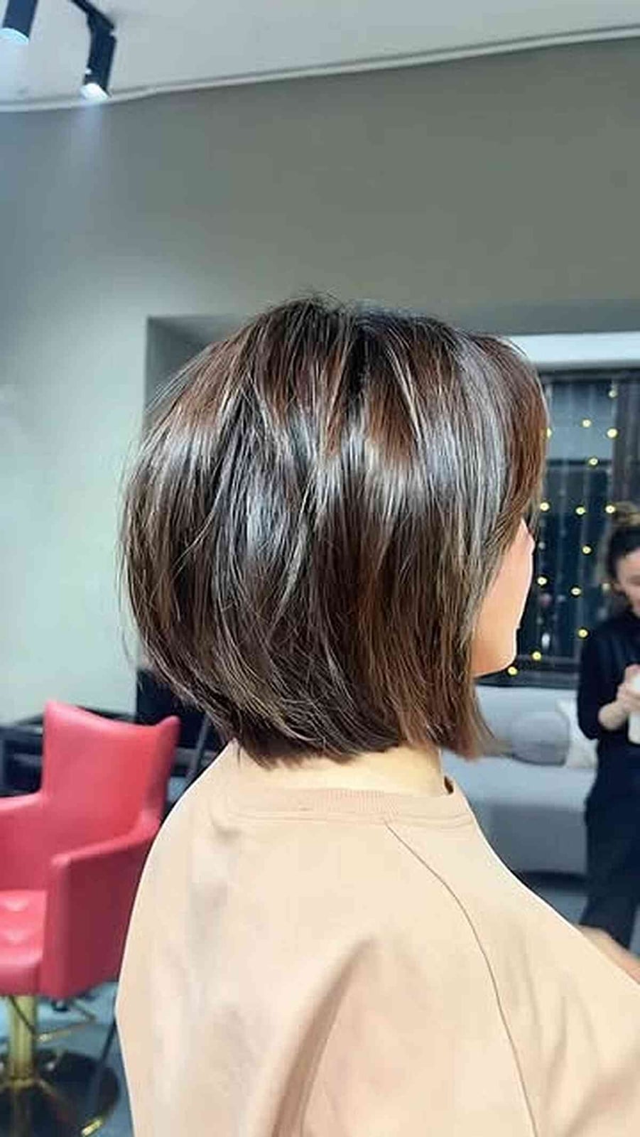Chin Stacked Bob With Side-Swept Bangs, Close-Up Take — Classy Stacked Bob