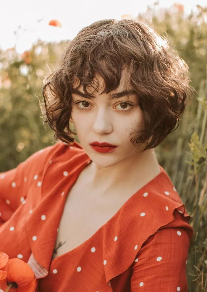 Curly Stacked Bob With Curtain Bangs — Classy Stacked Bob