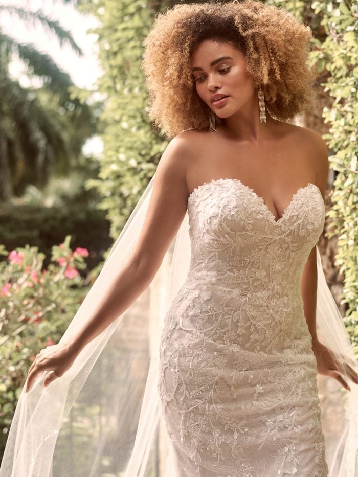 Honey Blonde Voluminous Curls With Curtain Bangs — Classy Strapless Dresses Hairstyles