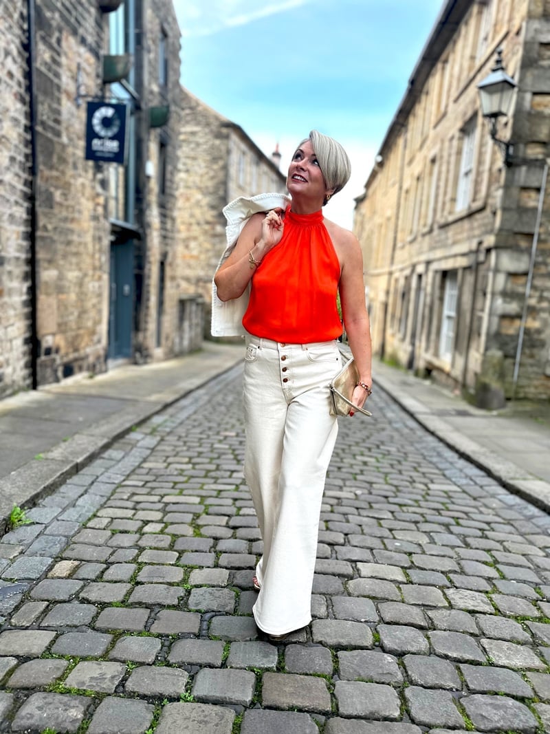 Vibrant Halter Top with Wide-Leg Cream Trousers — Classy Street Style Outfits