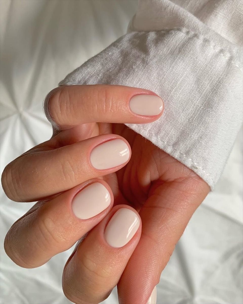 Milky Glossy Pale Beige Short Oval Nails Milky Glossy Pale Beige Short Oval Nails — Classy Tan Nails