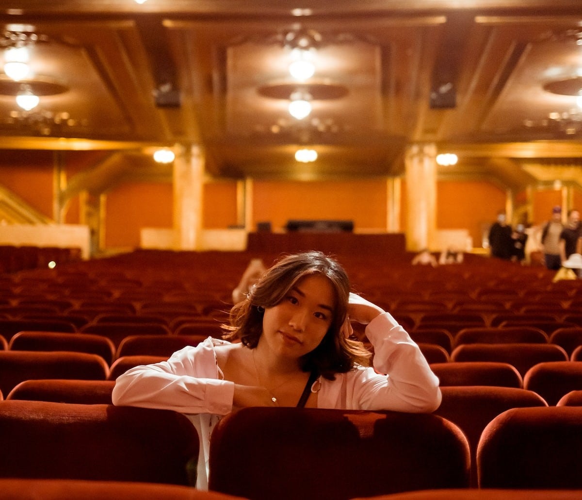 Light Pink Open Cardigan Over a White Top Light Pink Open Cardigan Over a White Top — Classy Theater Outfits