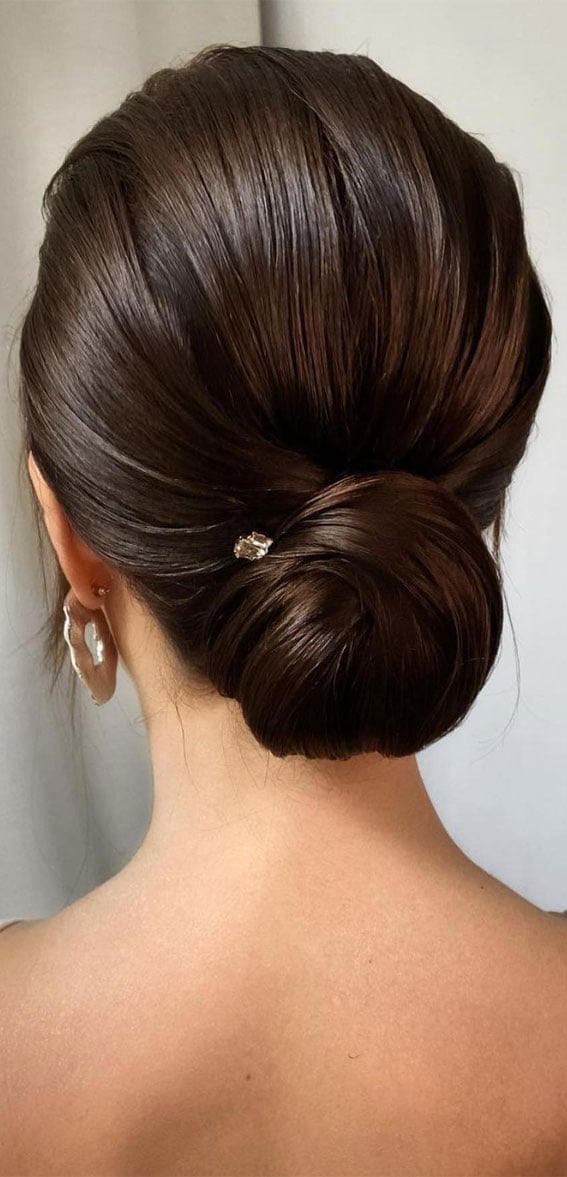 Long Dark Brown Sleek Low Bun Long Dark Brown Sleek Low Bun — Classy Trending Hairstyle
