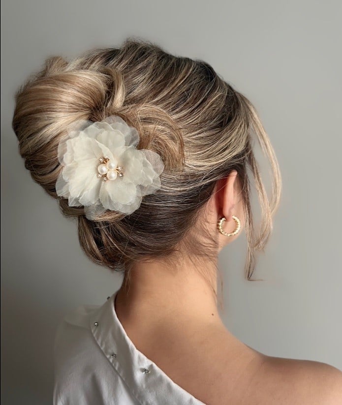 Elegant Updo With Floral Accessory Elegant Updo With Floral Accessory — Classy Trending Hairstyle
