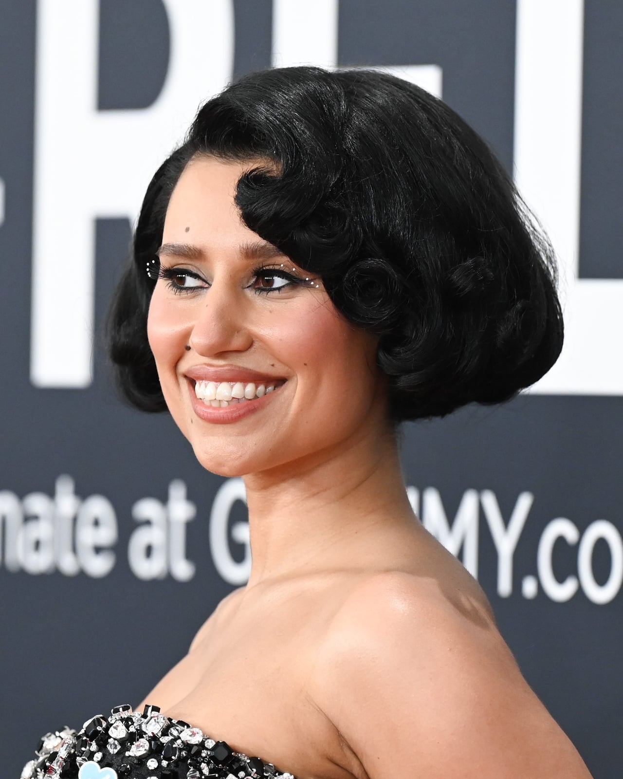 Chin-Length Black Bob With Vintage Curls Chin-Length Black Bob With Vintage Curls — Classy Trending Hairstyle