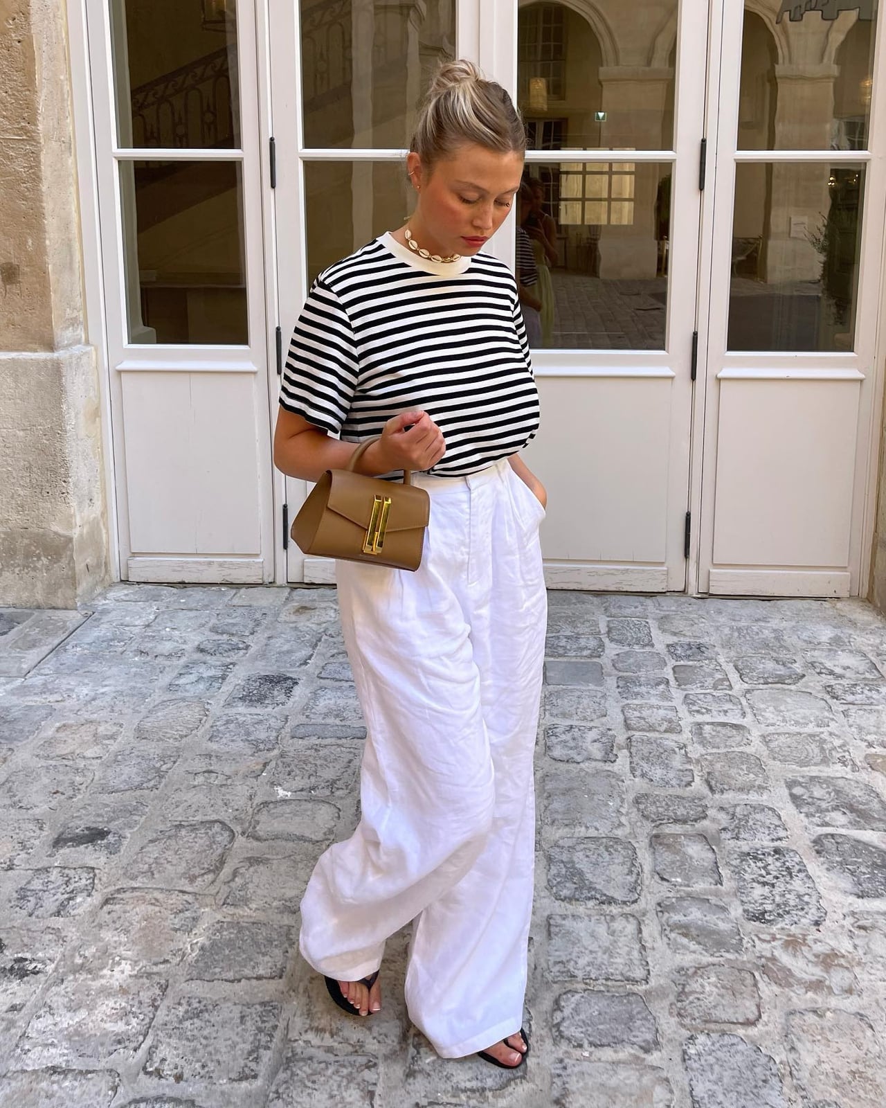 White Linen Wide-Leg Trousers with Striped T-Shirt for Casual Day Out White Linen Wide-Leg Trousers with Striped T-Shirt for Casual Day Out — Classy Trouser Outfits
