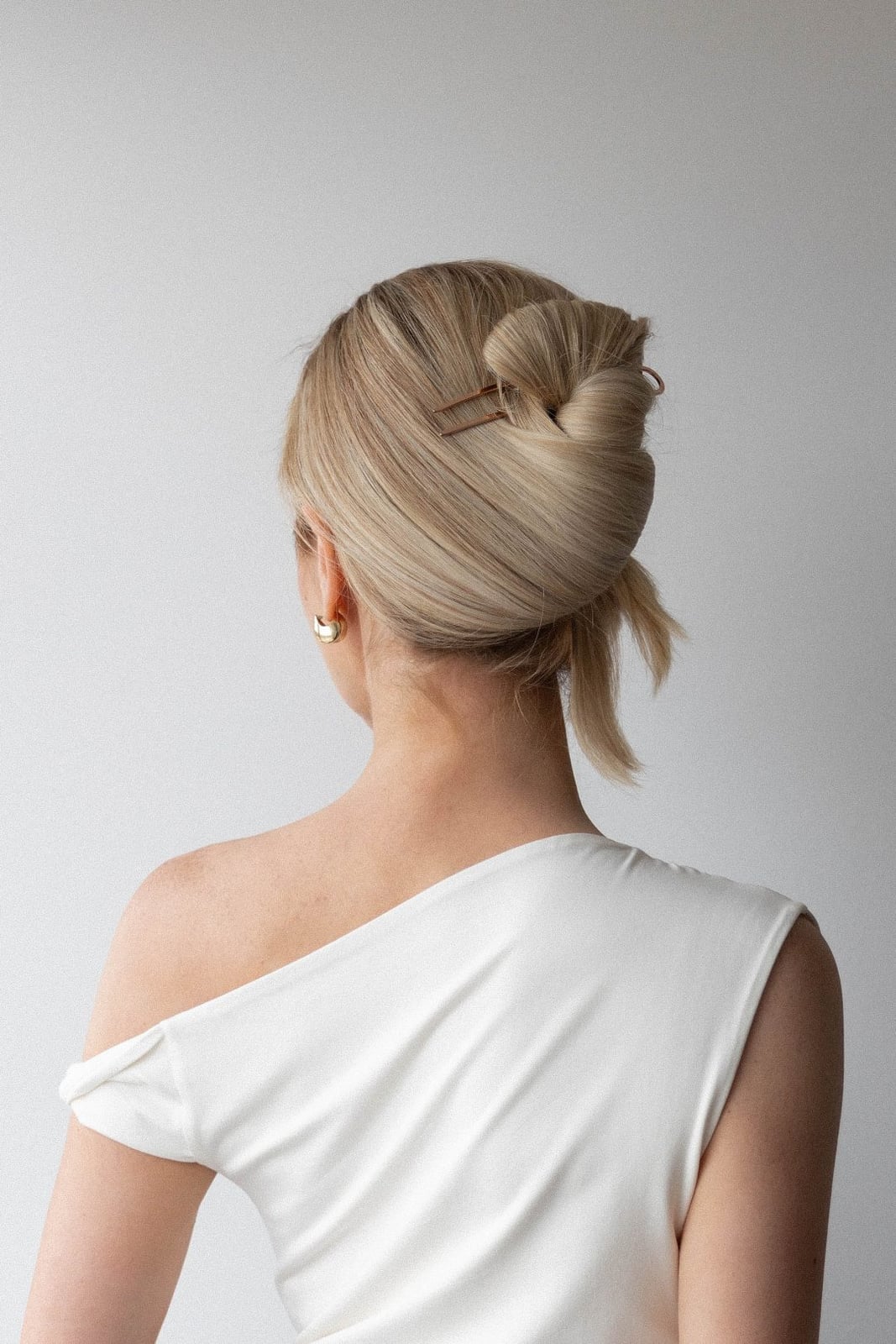 Sleek Blonde Bun With Hair Pins — Classy Twist Hairstyles