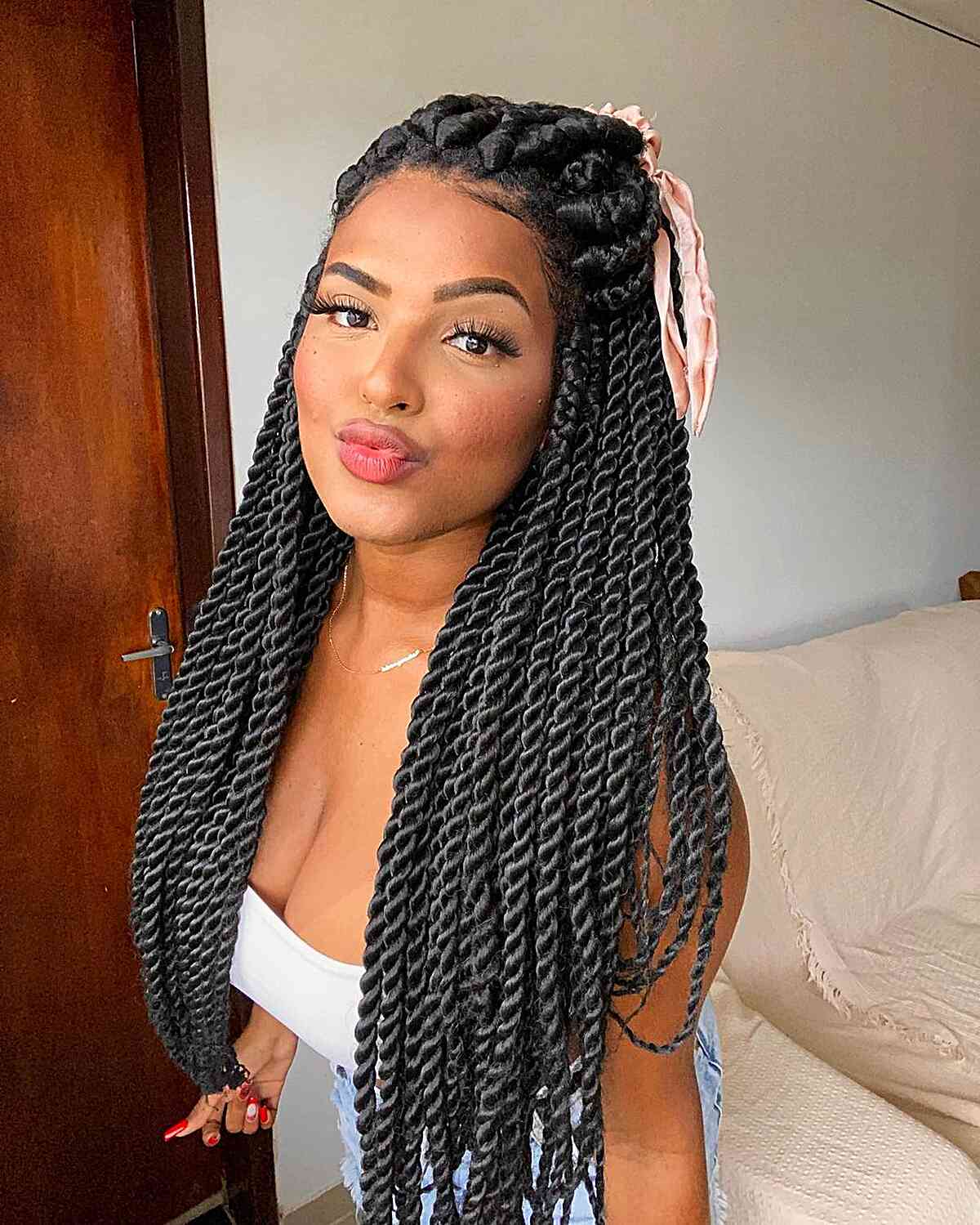 Mid-Back Black Twists With Pink Accessory — Classy Twist Hairstyles