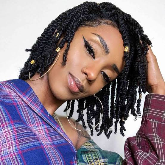 Chin Length Kinky Twists With Side Swept Bangs And Gold Accessories — Classy Twist Hairstyles