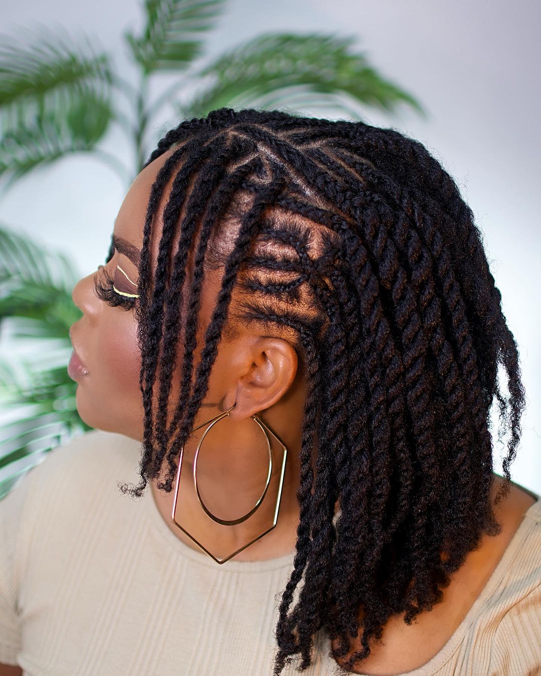 Collarbone Black Twists With Geometric Parting — Classy Twist Hairstyles