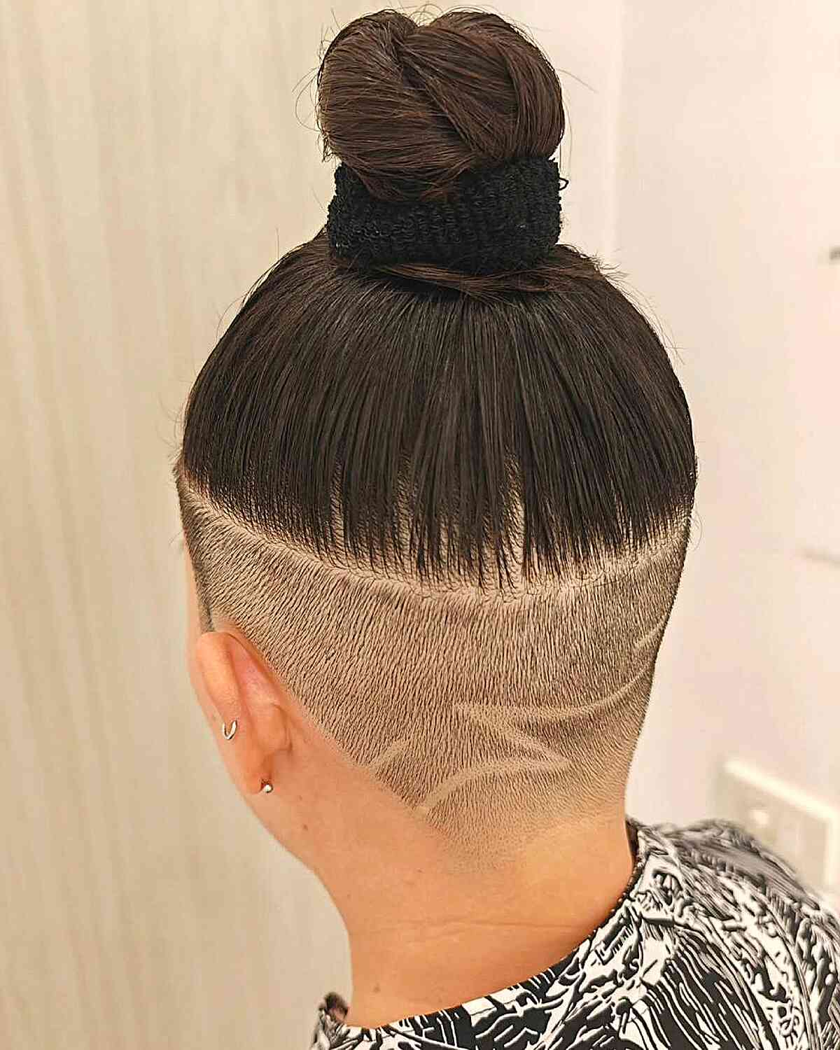 Dark Brown Undercut With Shaved Design and Top Knot — Classy Undercut Hairstyles