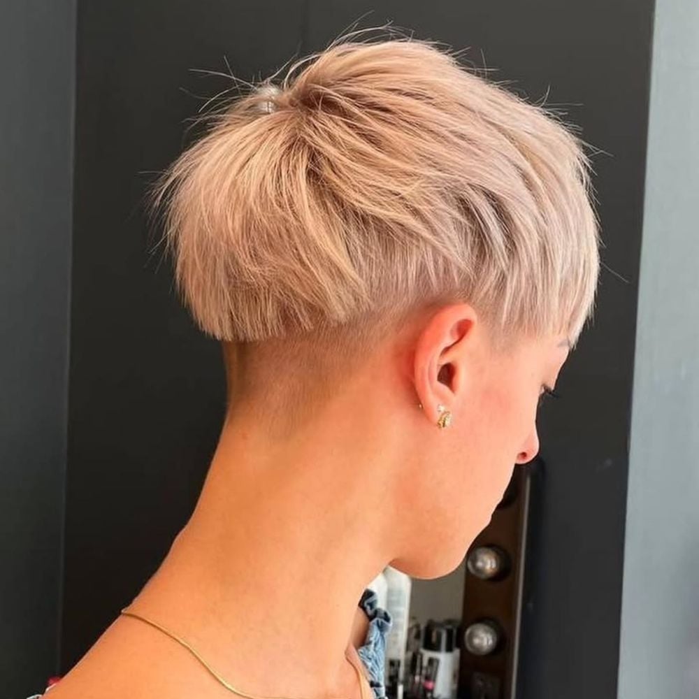Ash Blonde Pixie With Sharp Undercut and Forward Fringe — Classy Undercut Hairstyles