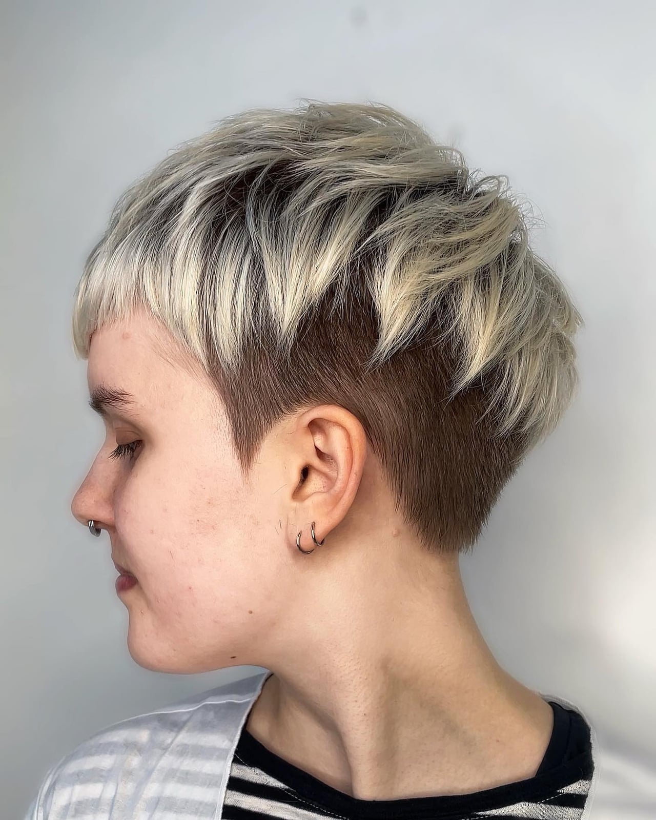 Ash Blonde Pixie With Undercut Nape And Forward Styling Ash Blonde Pixie With Undercut Nape And Forward Styling — Classy Undercut Pixie