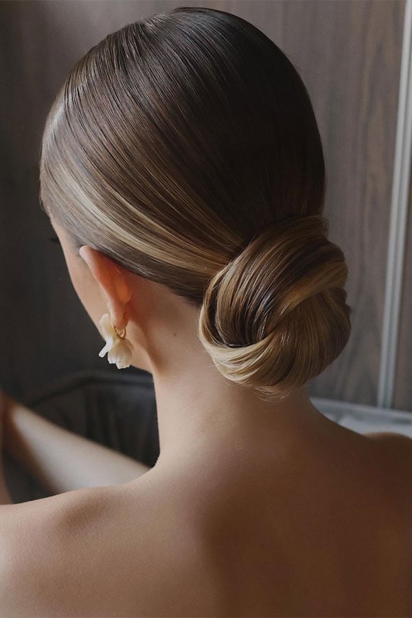 25 Stunning Updo Hairstyles for Every Occasion : Classic Sleek Chignon
