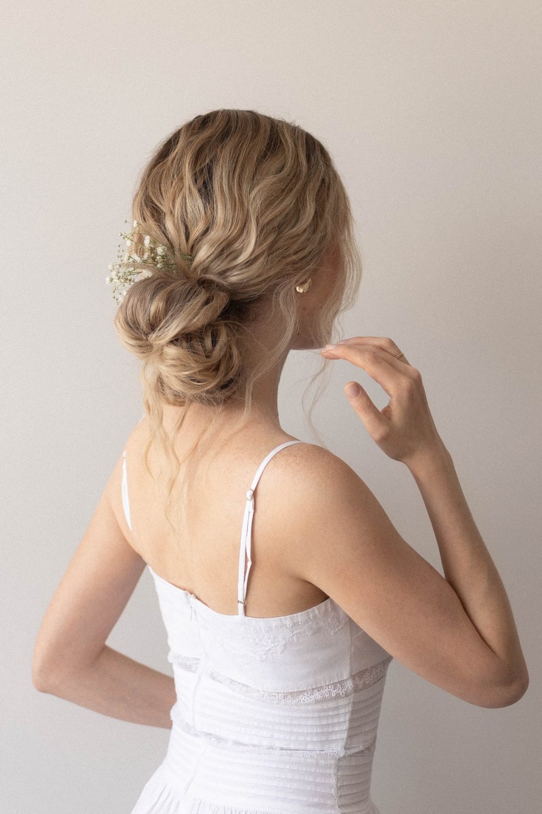 Ash Blonde Messy Updo with Floral Accent — Classy Updo Hair