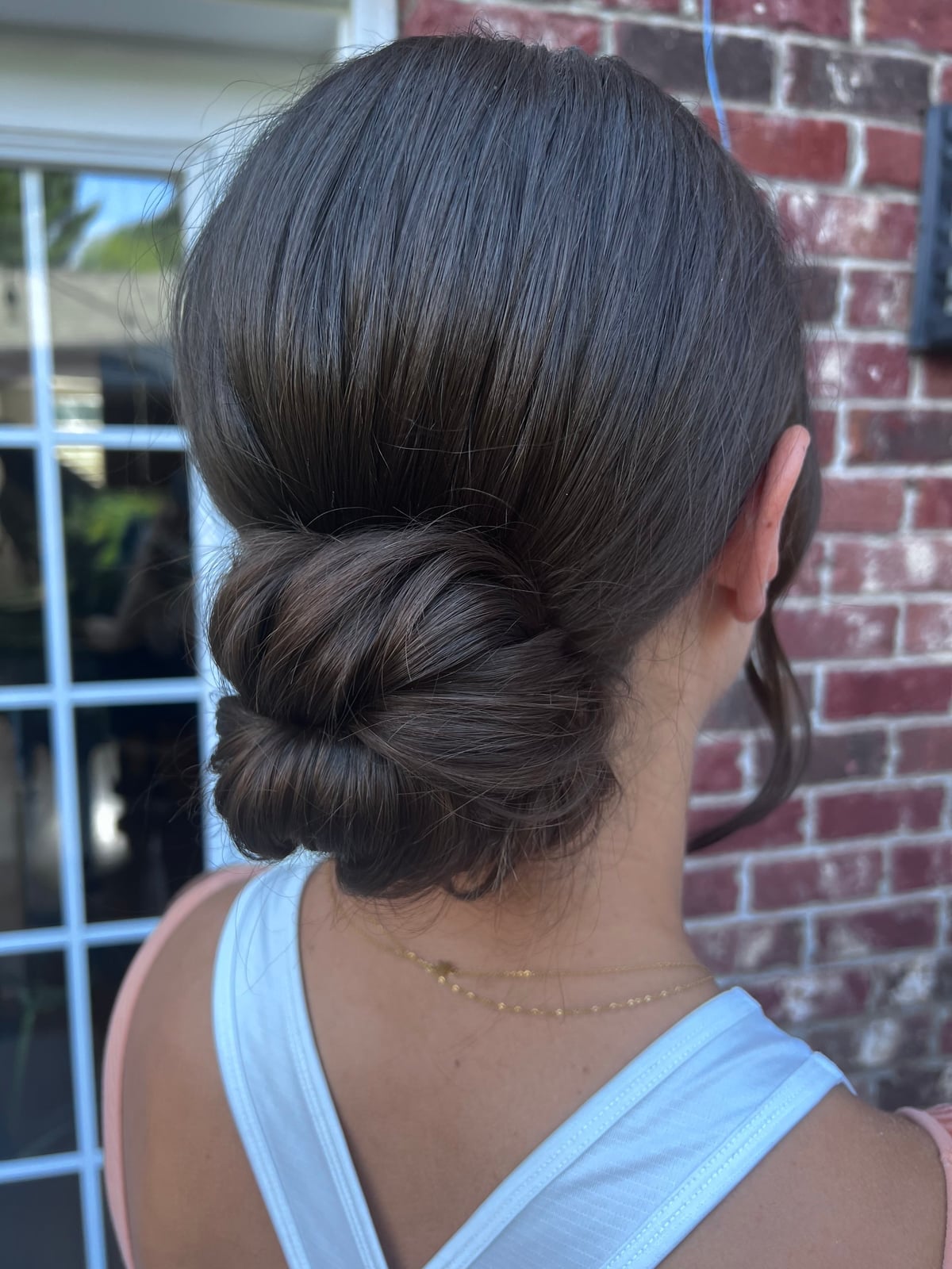 Dark Brown Twisted Low Bun, Close-Up Take — Classy Updo Hair