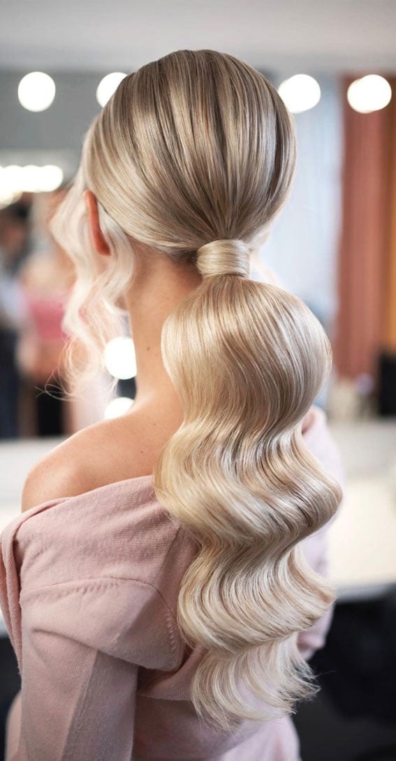53 Best Wedding Hairstyles for 2023 Brides : Classic Ponytail with Waves