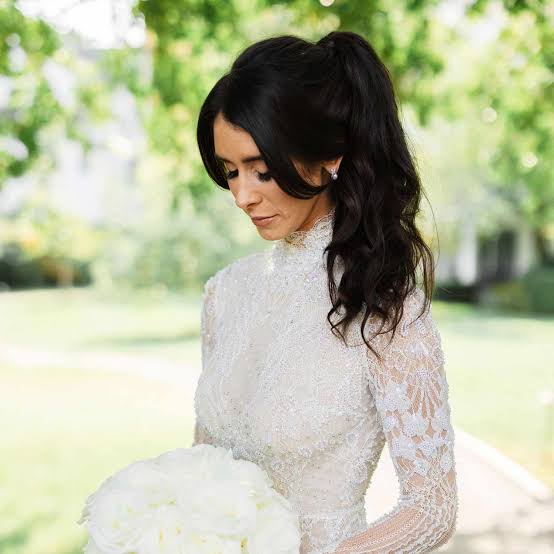 Voluminous Dark Brown Updo Ponytail With Soft Curls — Classy Updo Ponytail