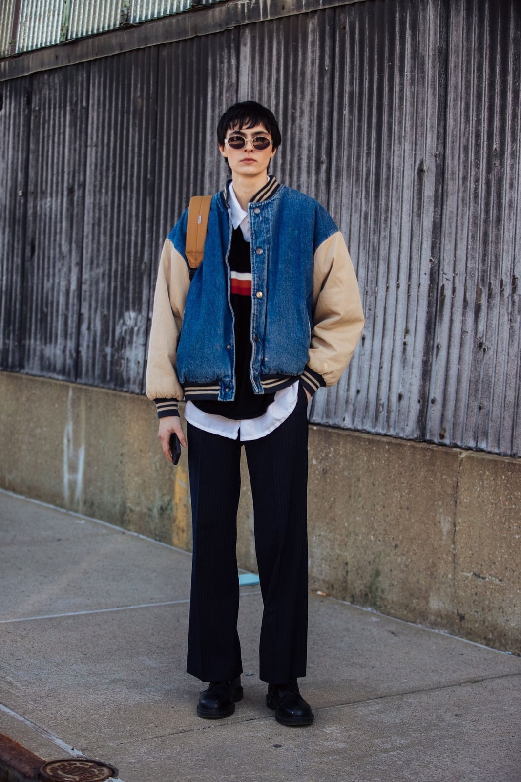 Denim and Tan Varsity Jacket with Striped Sweater and Black Trousers Denim and Tan Varsity Jacket with Striped Sweater and Black Trousers — Classy Varsity Jacket Outfits