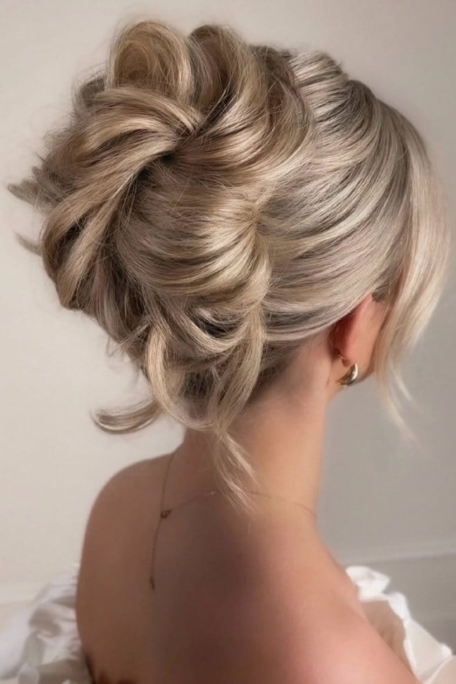 Elegant Updo With Sculpted Volume Elegant Updo With Sculpted Volume — Classy Volume Hair