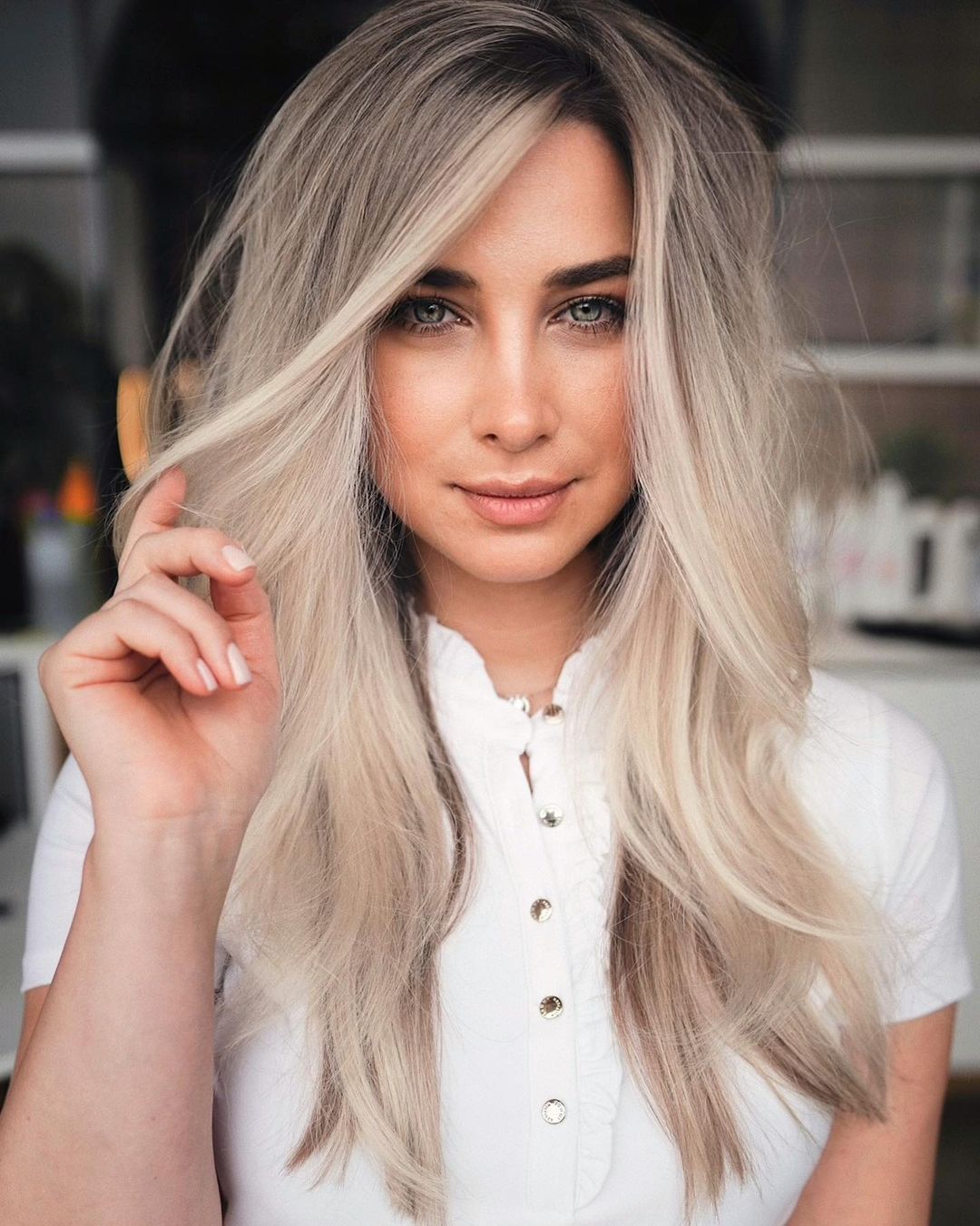 Platinum Blonde Mid-Back With Side-Swept Bangs Platinum Blonde Mid-Back With Side-Swept Bangs — Classy Volumizing Hair