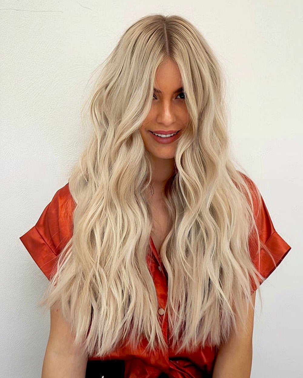 Mid-Back Platinum Blonde Waves With Curtain Bangs, Layers — Classy Wavy Hair Hairstyles