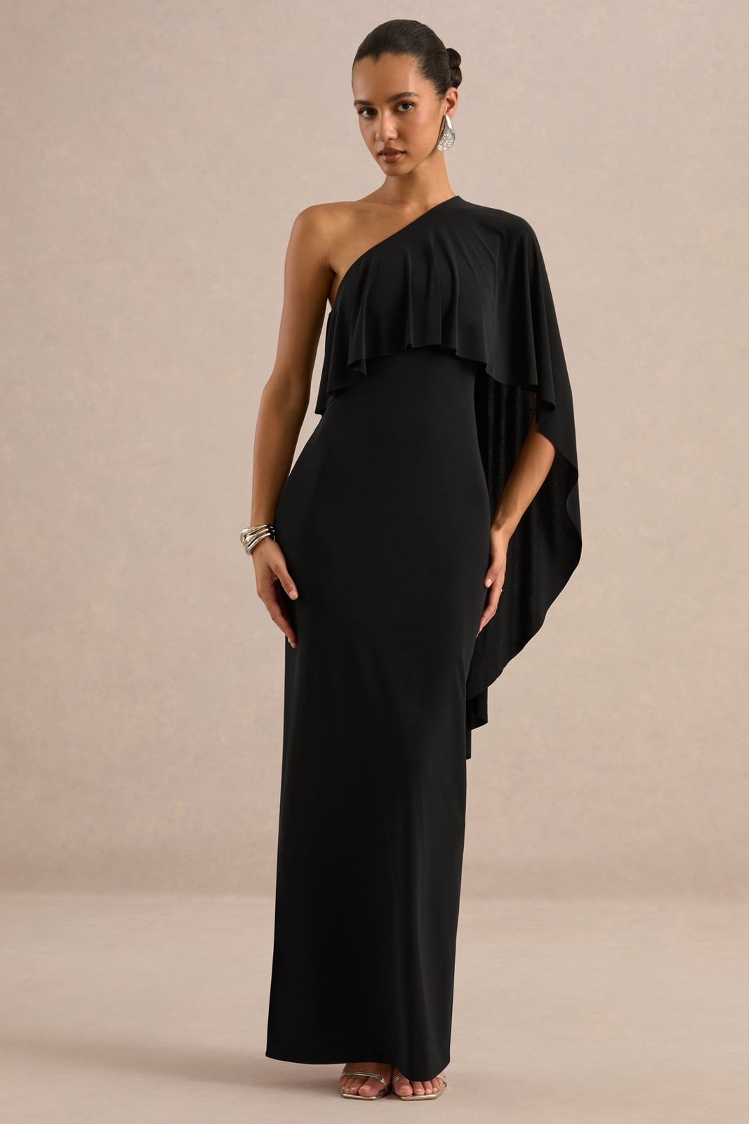 Black One-Shoulder Gown with Draped Cape Detail Black One-Shoulder Gown with Draped Cape Detail — Classy Wedding Guest Outfits