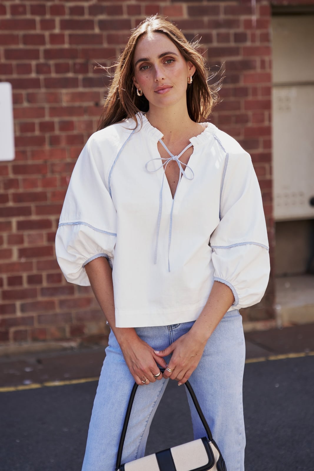 White Puff Sleeve Tie-Neck Blouse With Denim White Puff Sleeve Tie-Neck Blouse With Denim — Classy White Top Outfits