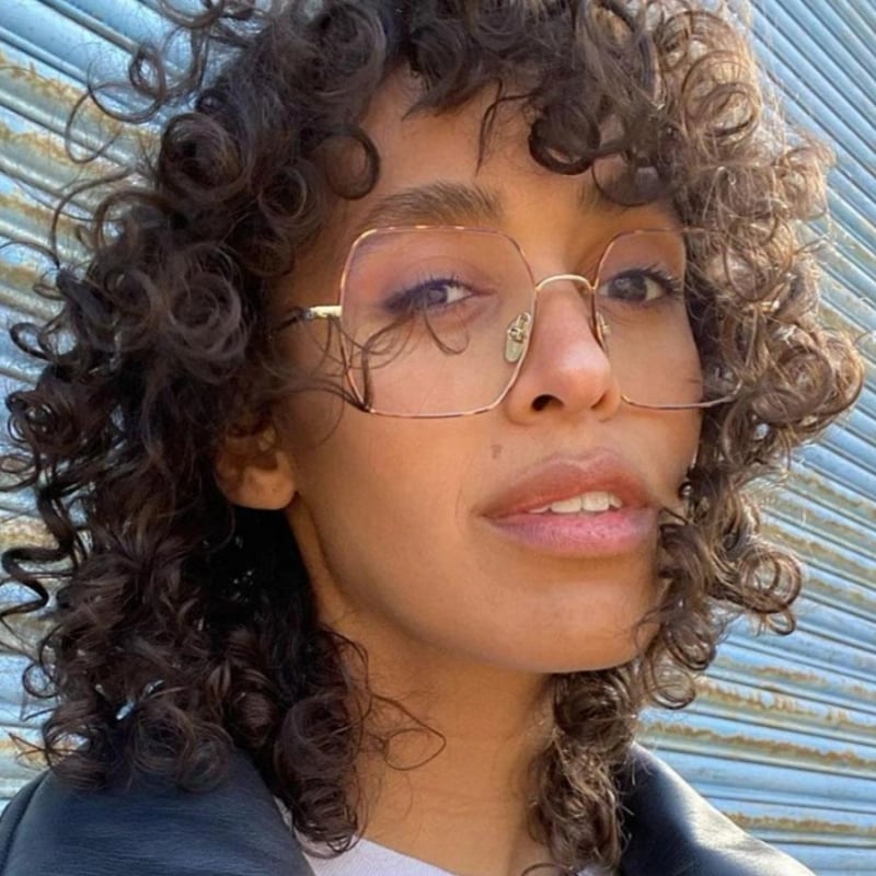 Shoulder Length Dark Brown Wolf Cut With Wispy Bangs Shoulder Length Dark Brown Wolf Cut With Wispy Bangs — Classy Wolf Cut Curly Hair