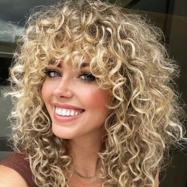 Voluminous Blonde Curly Wolf Cut Voluminous Blonde Curly Wolf Cut — Classy Wolf Cut Curly Hair