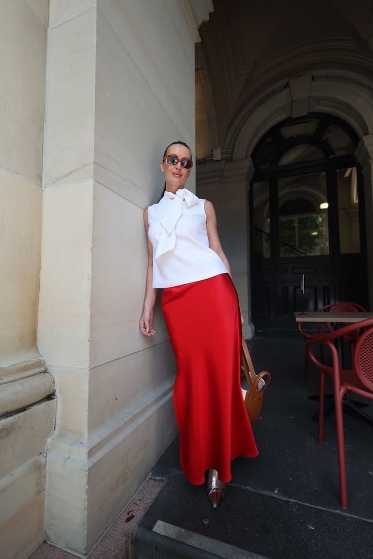 Red Satin Maxi Skirt With Bow Blouse and Pointed Metallic Heels Red Satin Maxi Skirt With Bow Blouse and Pointed Metallic Heels — Classy Work Party Outfits