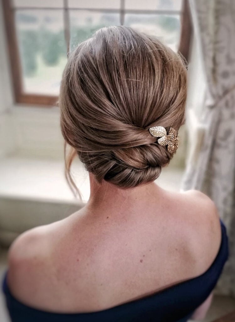Ash Blonde Twisted Low Bun With Accessory Ash Blonde Twisted Low Bun With Accessory — Classy Y2K Updo