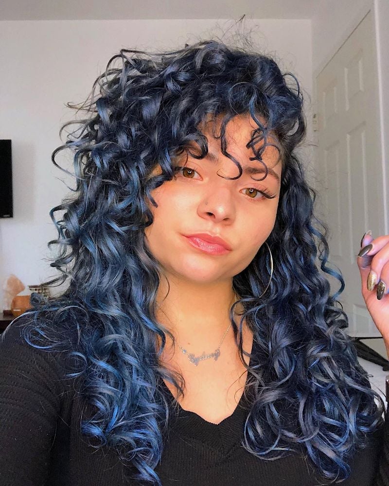 Mid-Back Dark Base With Vibrant Blue Highlights Mid-Back Dark Base With Vibrant Blue Highlights — Curly Hair Color Inspiration