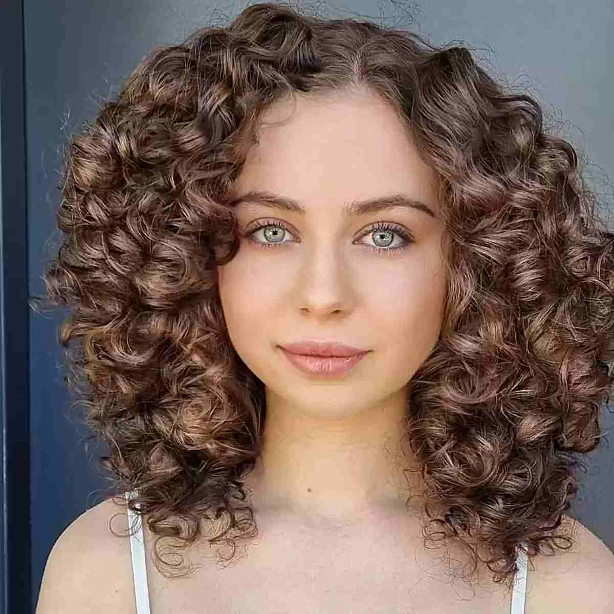 Collarbone Medium Brown Curly Layers Collarbone Medium Brown Curly Layers — Curly Hair Down Ideas