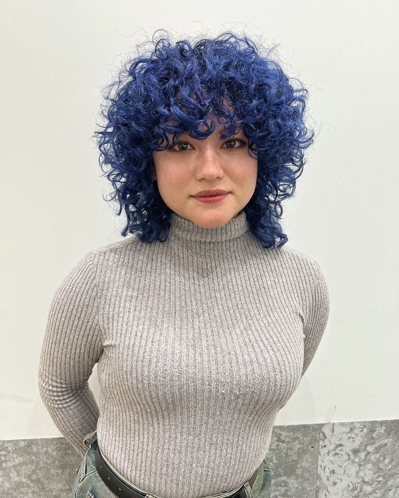 Collarbone Vivid Blue Shag With Curtain Bangs Collarbone Vivid Blue Shag With Curtain Bangs — Curly Hair Dye Styles
