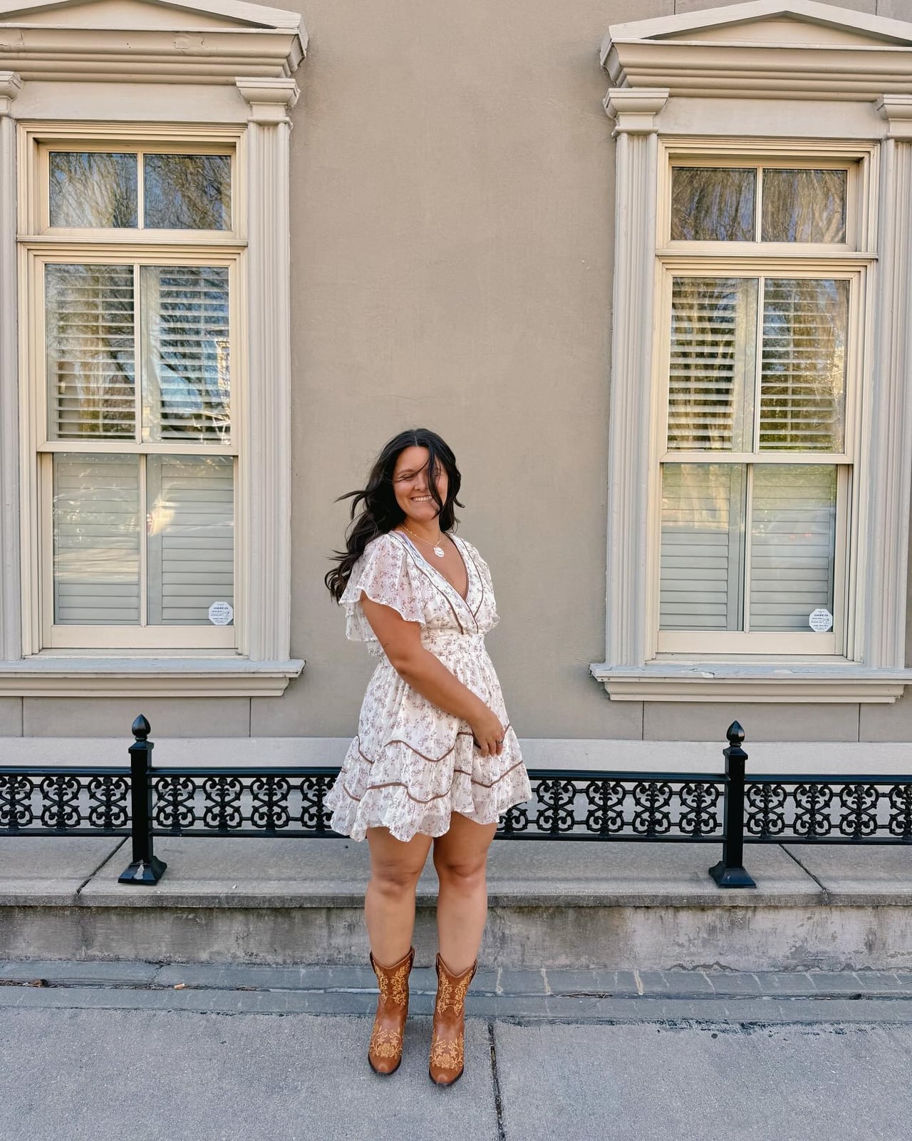 Floral Mini Dress and Embroidered Boots Concert Attire Floral Mini Dress and Embroidered Boots Concert Attire — Cute Concert Outfit Inspo