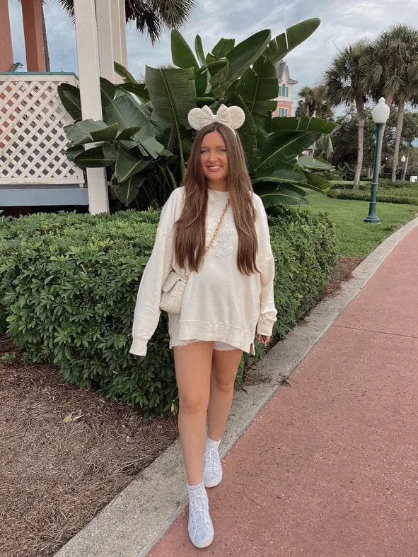 Cream Sweatshirt With White Shorts and Oversized Top — Cute Disney Outfit Inspo
