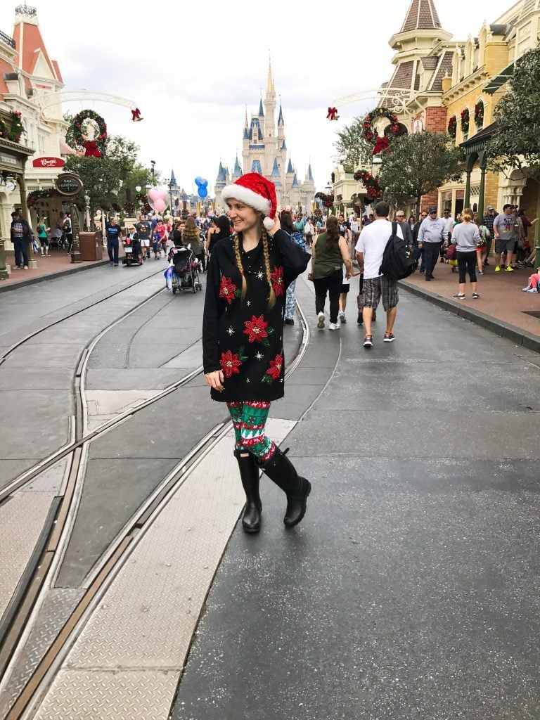 Sweater Dress With Festive Leggings and Black Knee-High Boots — Cute Disney Outfit Inspo