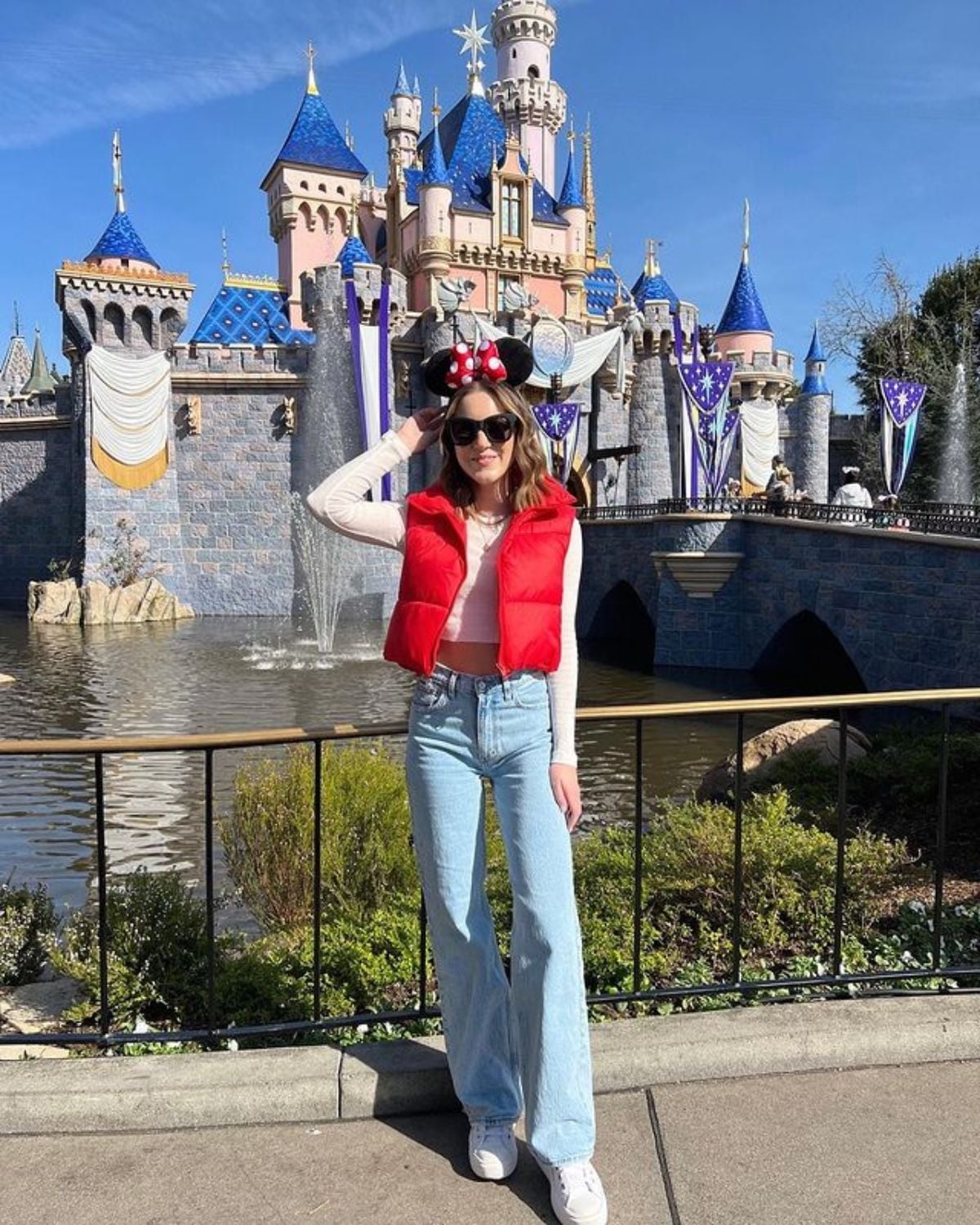 Red Puffer Vest Over White Top — Cute Disney Outfit Inspo